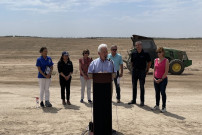 Rep. Costa speaking at podium